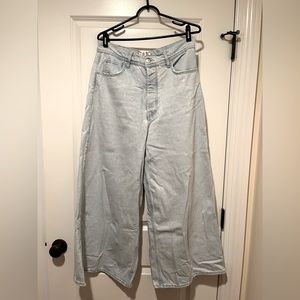 Free People High Rise Exaggerated light wash Flare Jeans Size 31